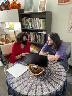 Dr. Barriga assisting a student in her office